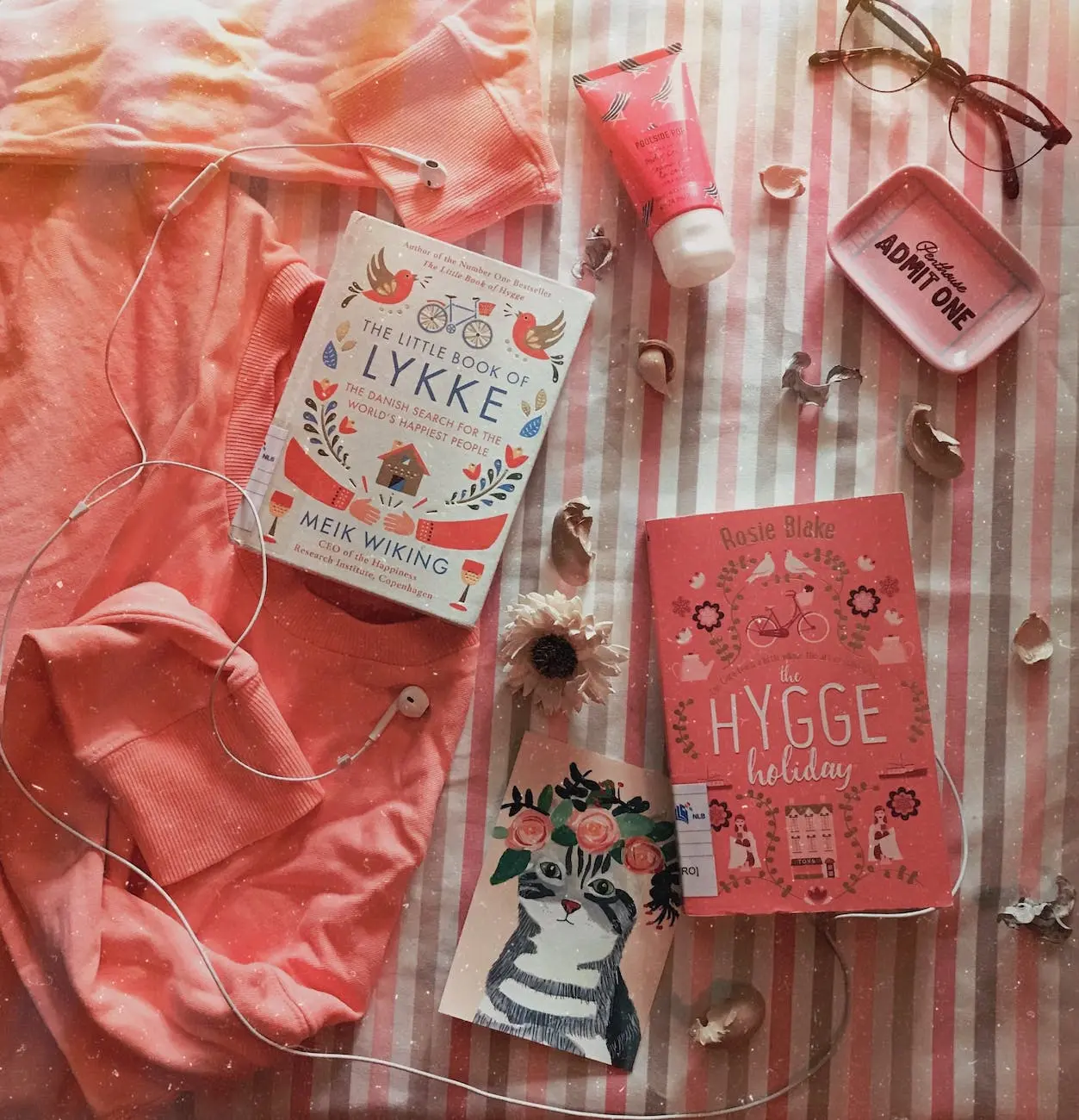 pink items lying on bed