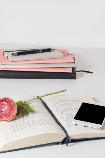 book on a white wooden table